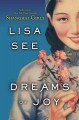 Cover image for a book by Lisa See, Dreams of Joy, with a young Chinese woman holding a branch with pink flower blossoms