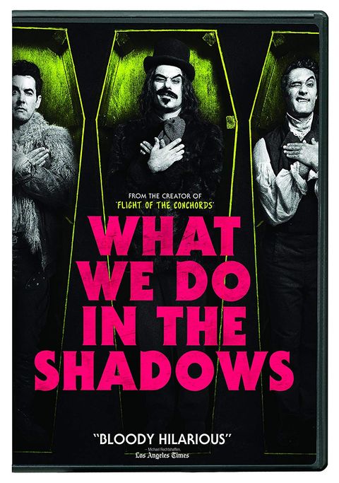 three vampires in coffins standing up against a green and black background with what we do in the shadows in pink text