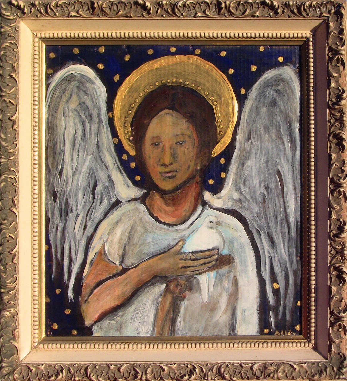 Angel with wings, holding a white dove