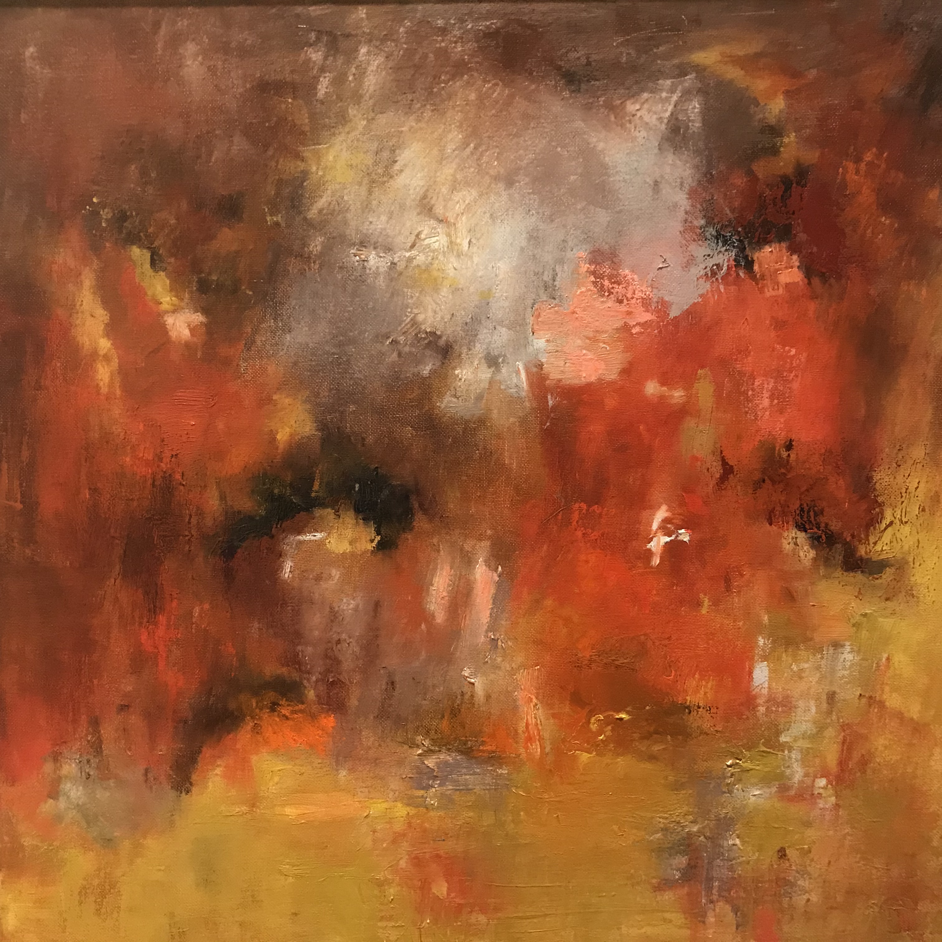 Abstract painting with cloud-like imagery in shades of red, orange, and yellow