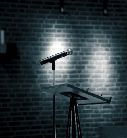 podium and music stand on empty stage