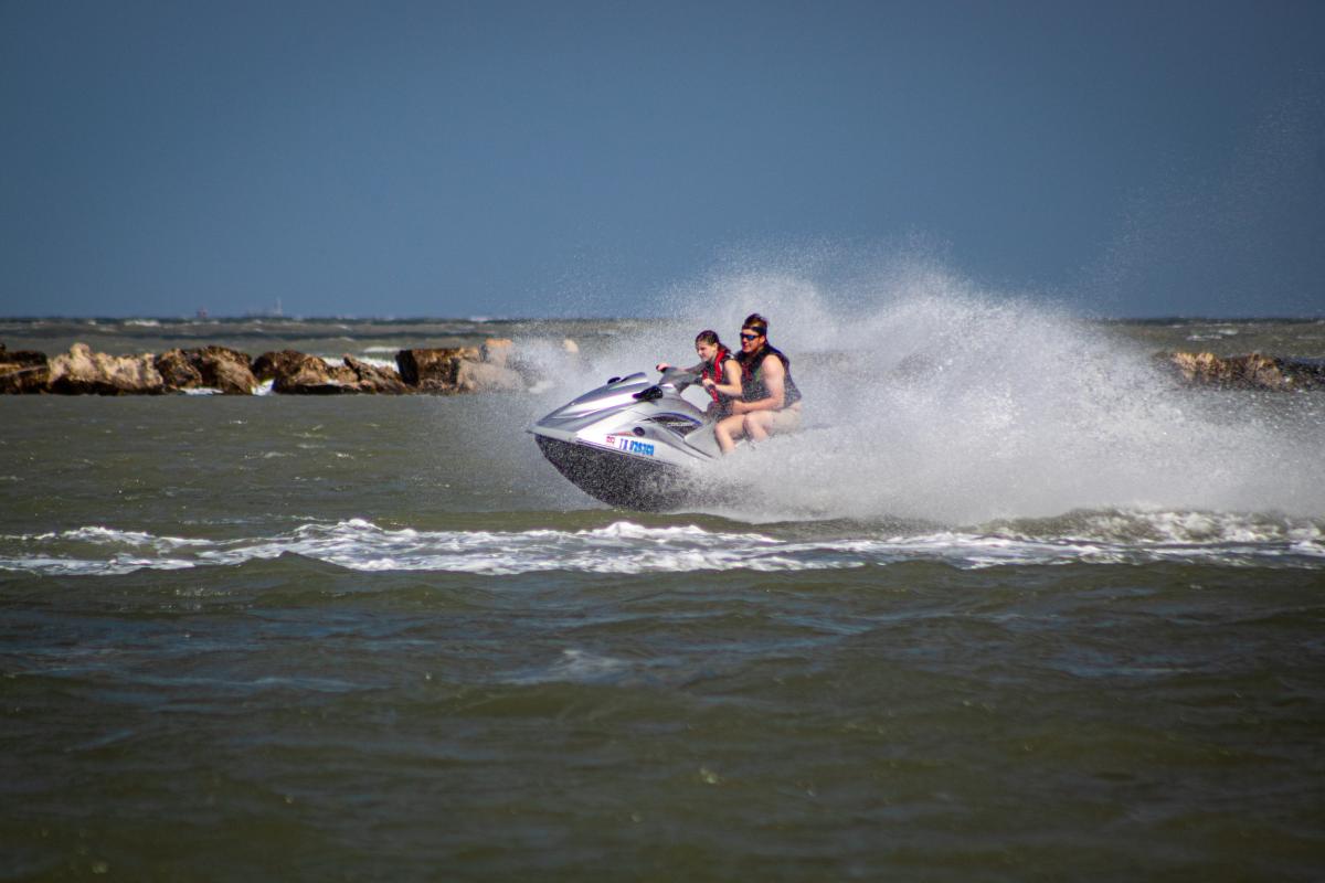 Father and daughter on waverunner